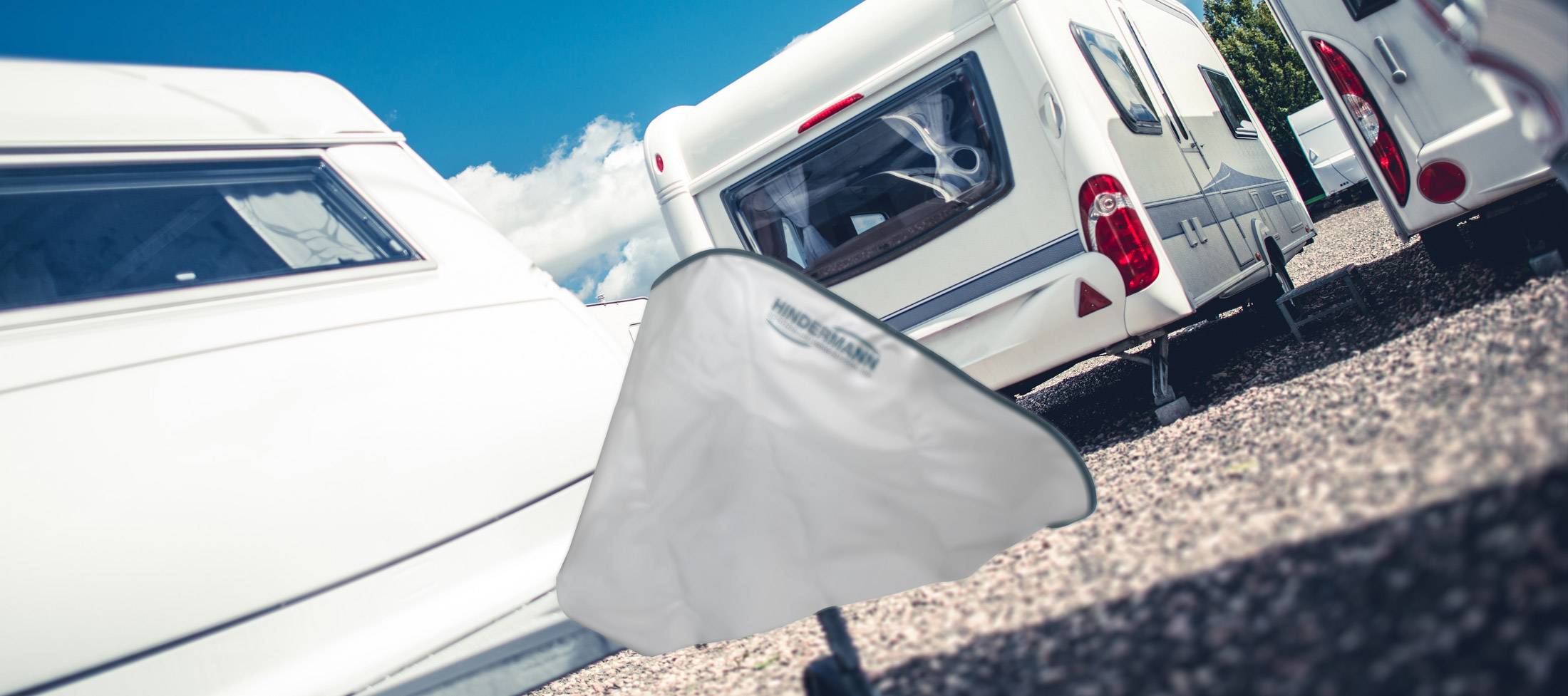 Individueller Logoaufdruck&nbsp;Schutzhüllen für Wohnmobile und Wohnwagen | HINDERMANN